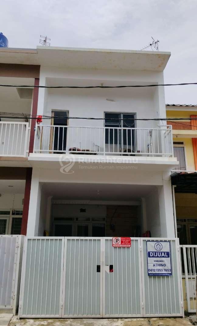 Dijual rumah minimalis sekat pasar laris taman Surya jakarta Barat 