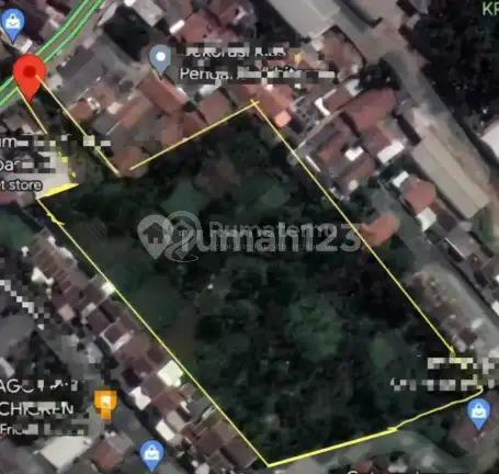 Tanah depan jalan Gunung Putri, dekat gerbang tol
