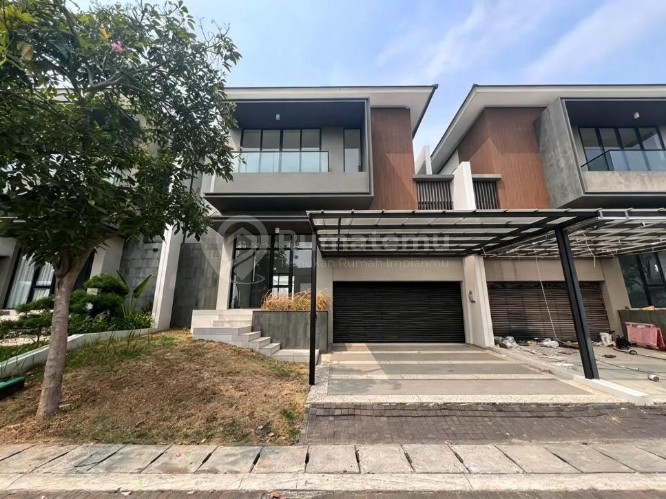 Cluster Bukit Danau Indah (Bdi), Pantai Indah Kapuk 2..Dijual Rumah Minimalis 2 Lantai, Siap Huni, Bagus dan Terawat, Listrik 4.400 Watt, Air Wtp, Hadap Timur Laut, Garasi 1 Mobil, Carport 1 Mobil.-Rr.0926