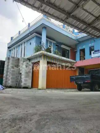 lahan /tempat usaha ex.bahan bangunan rumah 2 lantai harga murah di Cibinong