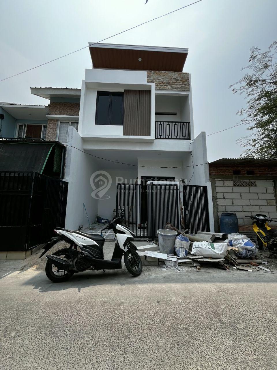 Rumah dua lantai perum Pondok ungu permai sektor v bekasi