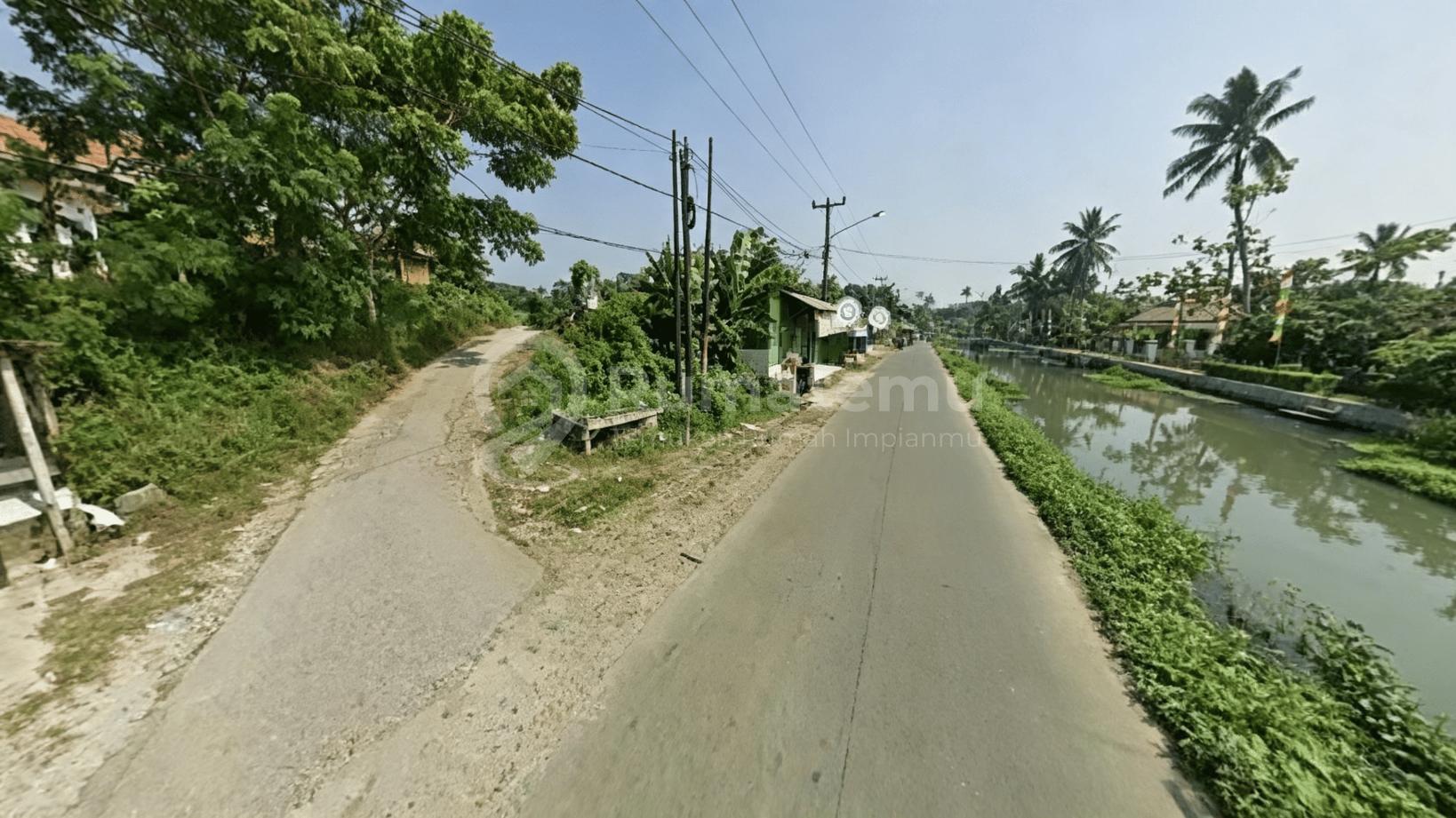 Termurah Dijual Tanah di Pakisjaya Karawang 4.950 M2 Pingir Jalan