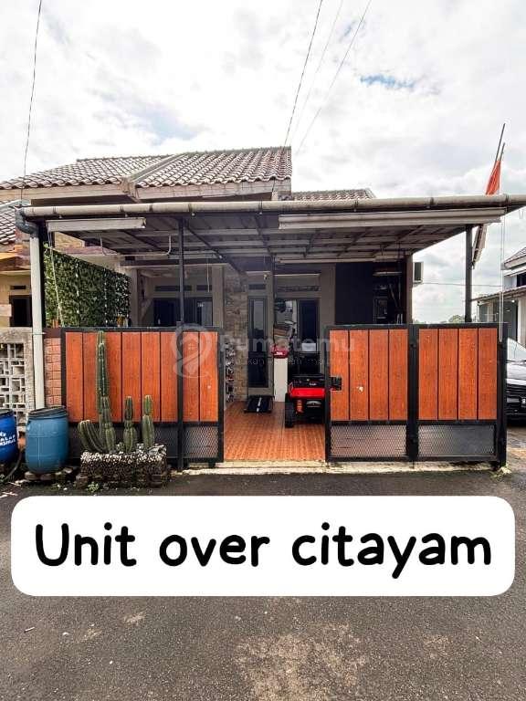 Rumah over kredit 85 jt nego siap huni dekat stasiun bebas banjir