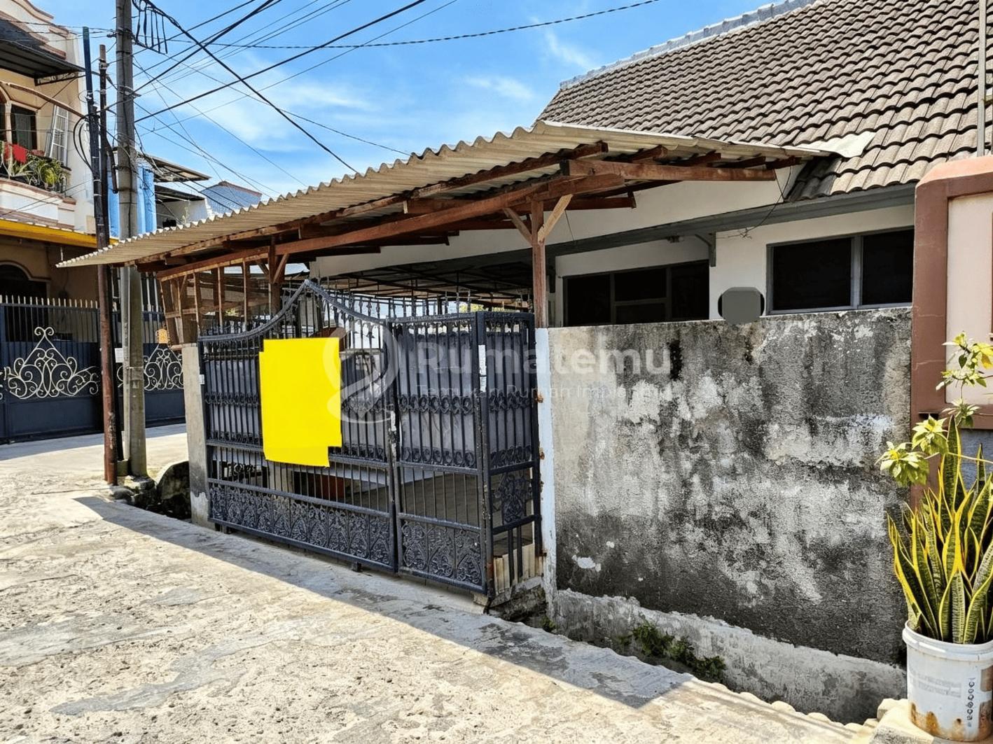 Dijual rumah B U perum daan mogot estate (hitung tanah saja) tanah lebar di belakang